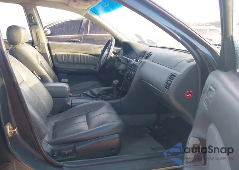 1997 Nissan Maxima Gle/Gxe/Se z USA, uszkodzony, nr VIN JN1CA21D0VT803567